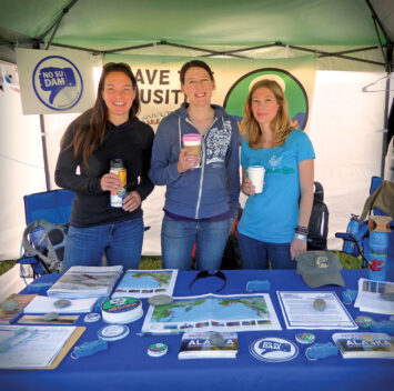 Collecting signatures to oppose the Susitna Dam at Salmon Fest 2015